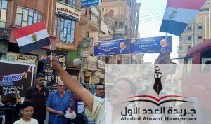 في ذكرى 30 يونيو "حماة الوطن" بالمنزلة يشارك المواطنين احتفالاتهم بتوزيع الأعلام المصرية